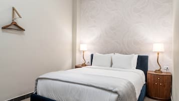 Deluxe Room | 1 bedroom, premium bedding, blackout curtains