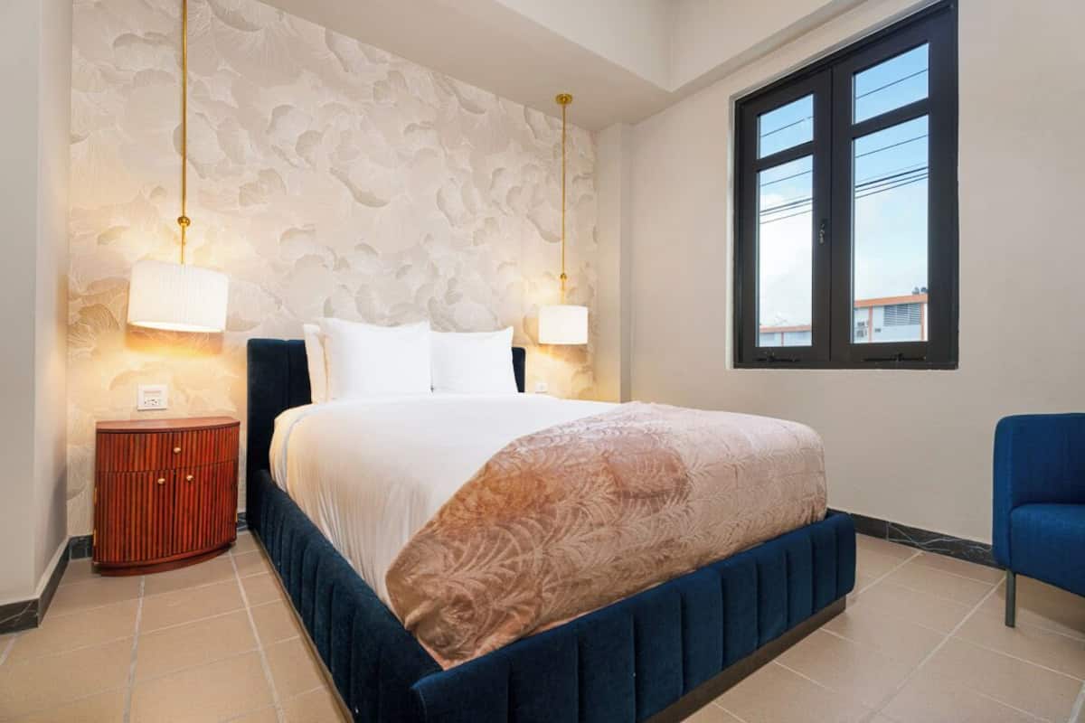1 bedroom, premium bedding, blackout curtains, iron/ironing board