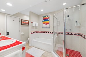 Shower, eco-friendly toiletries, hair dryer, towels