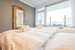 1 slaapkamer, een strijkplank/strijkijzer, wifi, beddengoed