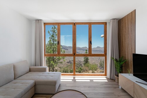 Casa de vacaciones 'Los Mojones' con vistas a la montaña, Wi-Fi y aire acondicionado