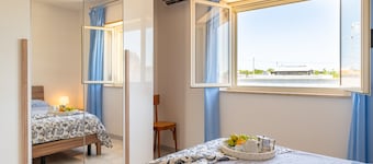 'Villetta Cara Mia, Costa Merlata' Apartment with Private Terrace, Garden & Air Conditioning