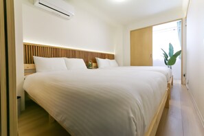 2 slaapkamers, een bureau, een strijkplank/strijkijzer, gratis wifi