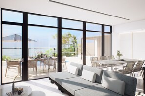 A modern living room with a sofa, dining table, and chairs, large windows, and a view of the outdoors. - Morris Resort Tohginbow (Sakai)