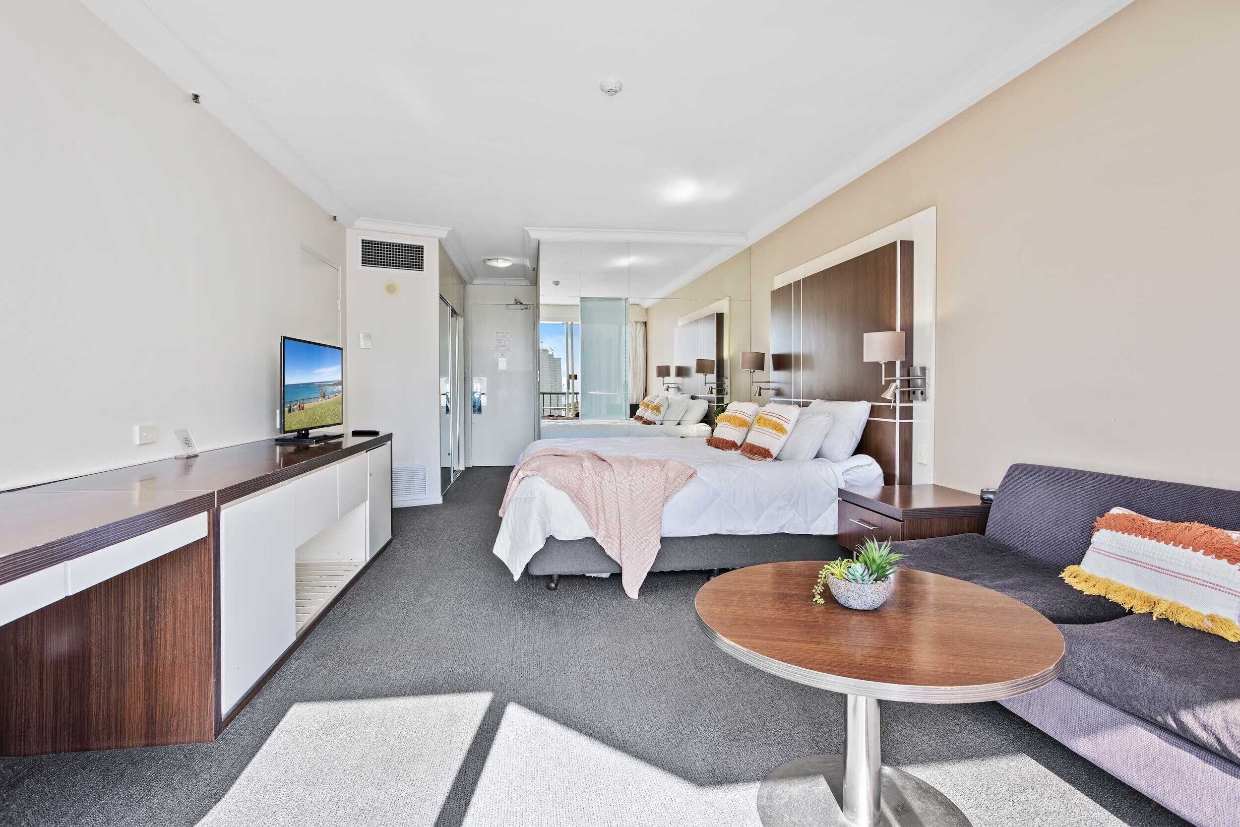 Deluxe Studio with Ocean View | Living area | TV