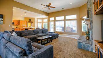 Smart TV, fireplace, books, offices