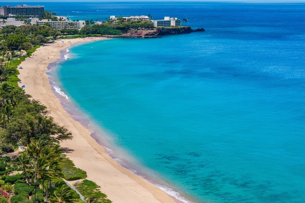 On the beach, sun loungers, beach towels