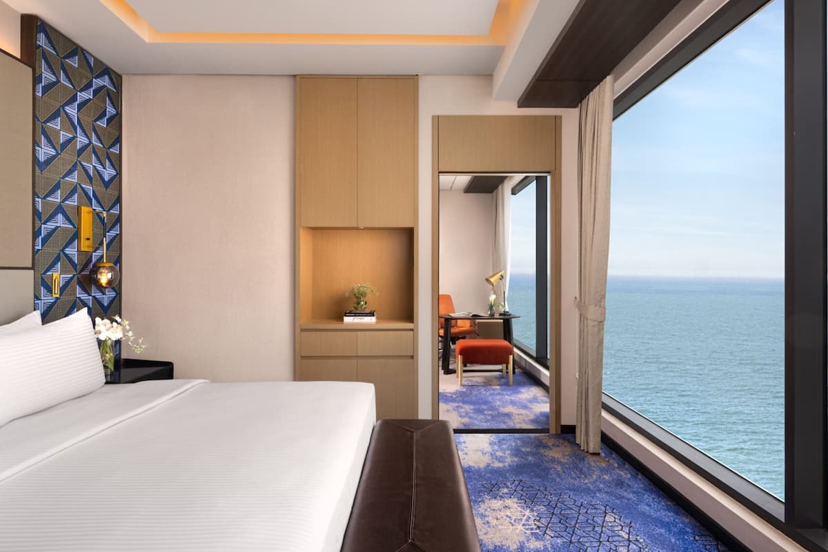 Suite ejecutiva, vista al océano | Ropa de cama de alta calidad y minibar