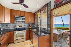 Fridge, microwave, oven, stovetop - Poipu Makai Villas C1 – Oceanfront, A/C, PBAC Included (Koloa)