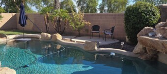 Cozy 3-bedroom house with a pool in welcoming Goodyear with AC, WiFi