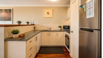 Comfort House, Multiple Beds, Non Smoking, Beach View | Private kitchen | Full-size fridge, microwave, oven, stovetop