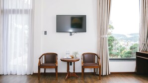 ห้องแฟมิลี่สำหรับสี่ท่าน, วิวเมือง | เครื่องนอนระดับพรีเมียม, มินิบาร์, โต๊ะทำงาน, พื้นที่ทำงานแบบใช้แล็ปท็อป