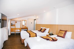 Ropa de cama de alta calidad, minibar y escritorio