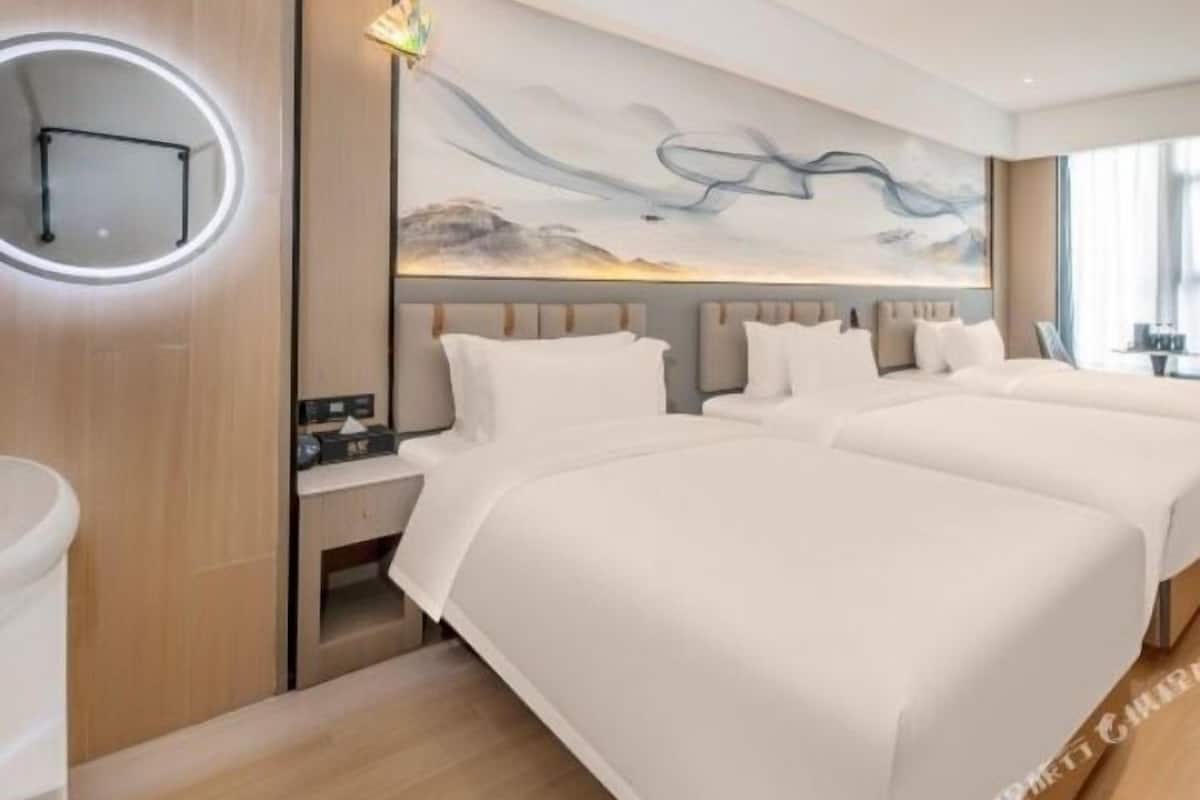 Chambre Triple Familiale, vue ville | Wi-Fi gratuit