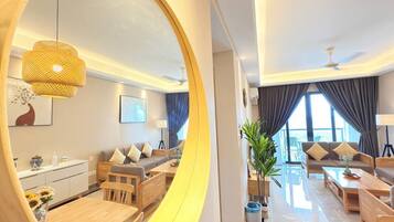 Deluxe Apartment | Living area | TV