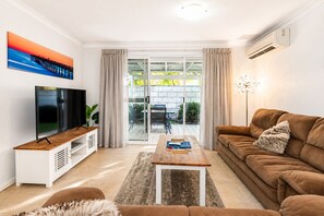 Comfort House, 2 Bedrooms, Non Smoking | Living area | 60-inch TV with digital channels - Ocean Blue Bungalow (Broadwater)