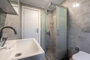 Apartment, Garden View | Bathroom | Shower, hair dryer, towels, soap - Atli Apart (Fethiye)