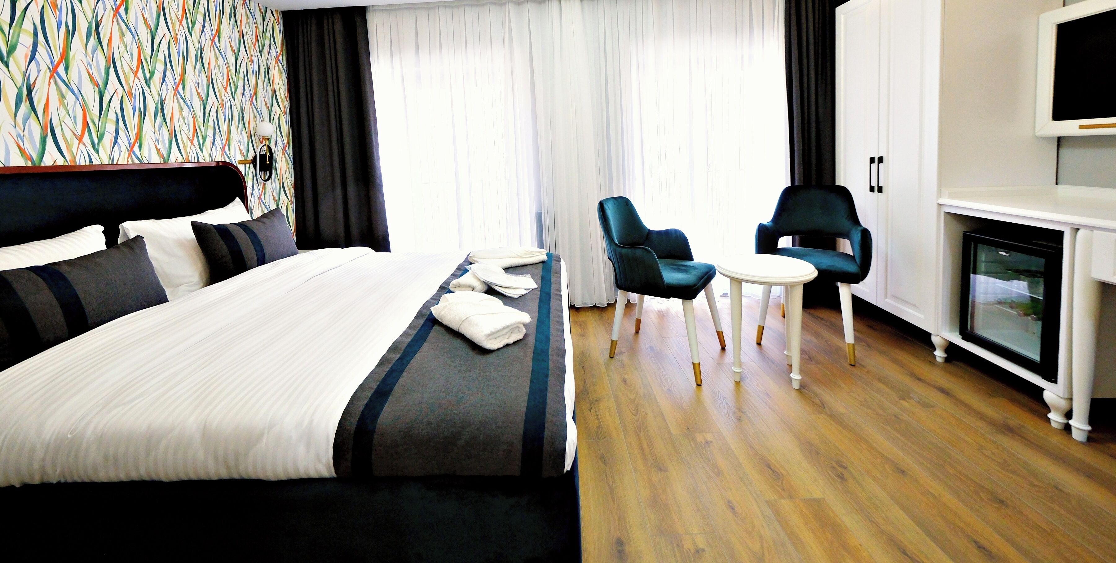 Doppia Deluxe, 1 letto queen, vista città | Biancheria da letto di alta qualità, materassi in memory foam