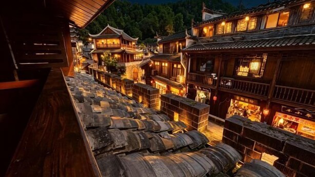 A traditional wooden building with multiple levels and a stone pathway.