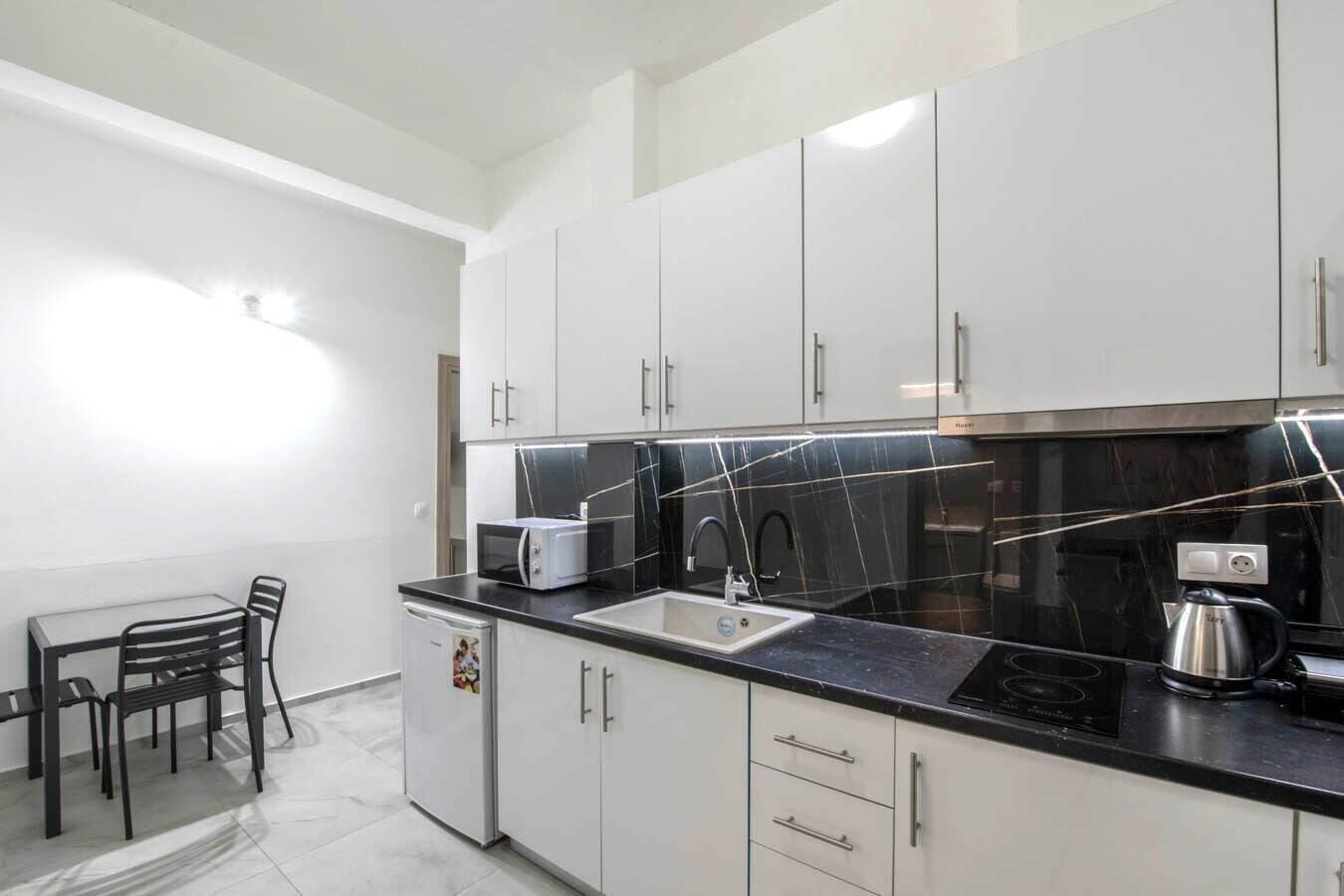 Microwave, stovetop, coffee/tea maker, toaster