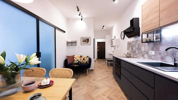 Apartment | Private kitchen | Fridge, oven, stovetop, dishwasher