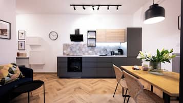 Apartamento | Cozinha privada | Geladeira, fogão, cooktop, lava-louças