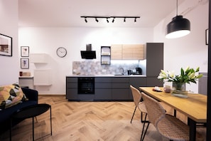 Apartment | Private kitchen | Fridge, oven, stovetop, dishwasher