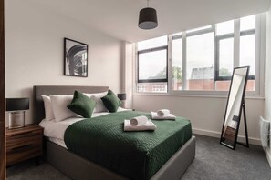 1 slaapkamer, een strijkplank/strijkijzer, wifi, beddengoed