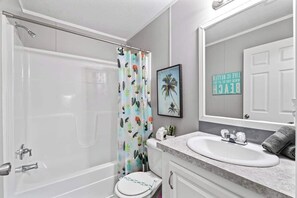 Shower, hair dryer, shampoo