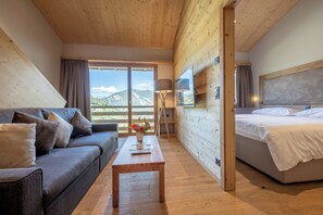 Appartement 5 personnes - 2 chambres - Duplex | Living area | 100-cm TV with cable channels, table tennis - SWISSPEAK Resorts by Pierre & Vacances Premium Vercorin (Chalais)