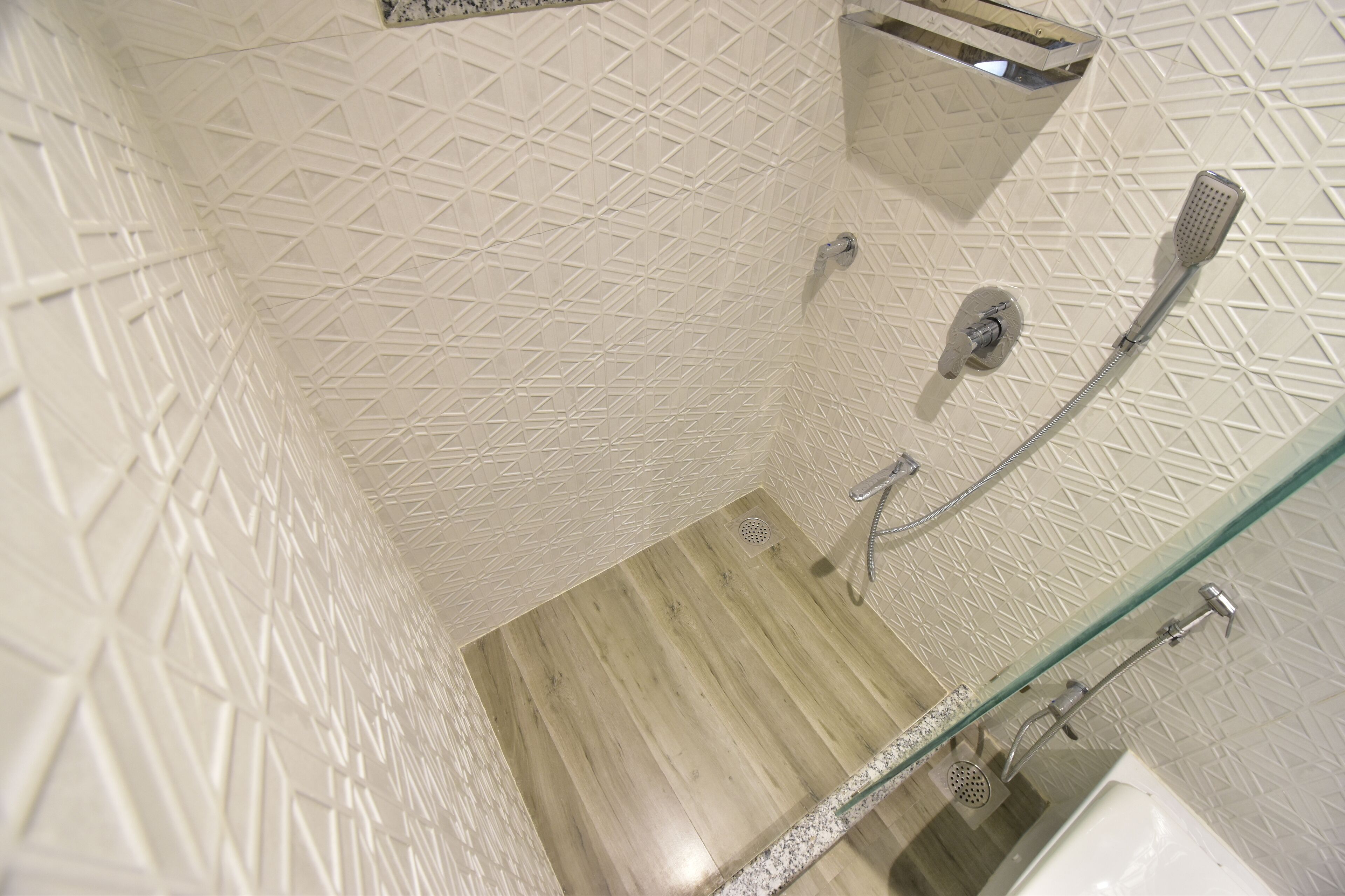 Shower, hair dryer, towels, toilet paper