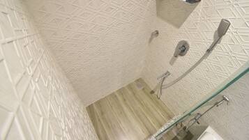 Shower, hair dryer, towels, toilet paper