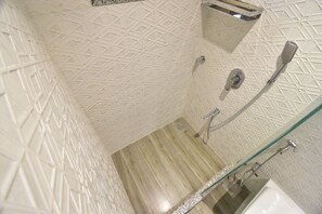 Shower, hair dryer, towels, toilet paper