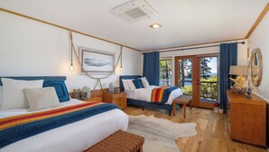 A hotel room with two beds, a bench, a large window, and a view of the outdoors. - Waterfront Retreat w/ Sauna | Whales & Sunrises (Friday Harbor)