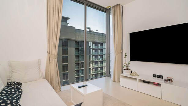 Appartement Deluxe | Coin séjour | Télévision