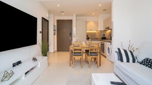 Appartement Deluxe | Coin séjour | Télévision
