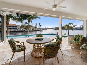Outdoor dining - Sultry Southern Exposure at this Delightful Waterfront Vacation Home... (Marco Island)