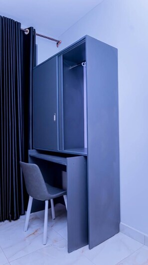 Premium bedding, down duvets, memory-foam beds, individually decorated - Fanfare Suites (Kigali)