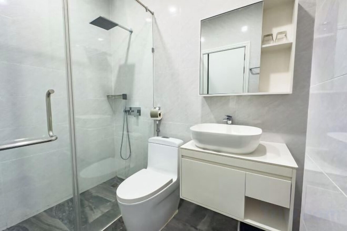 Bathroom | Shower, hair dryer, bathrobes, slippers