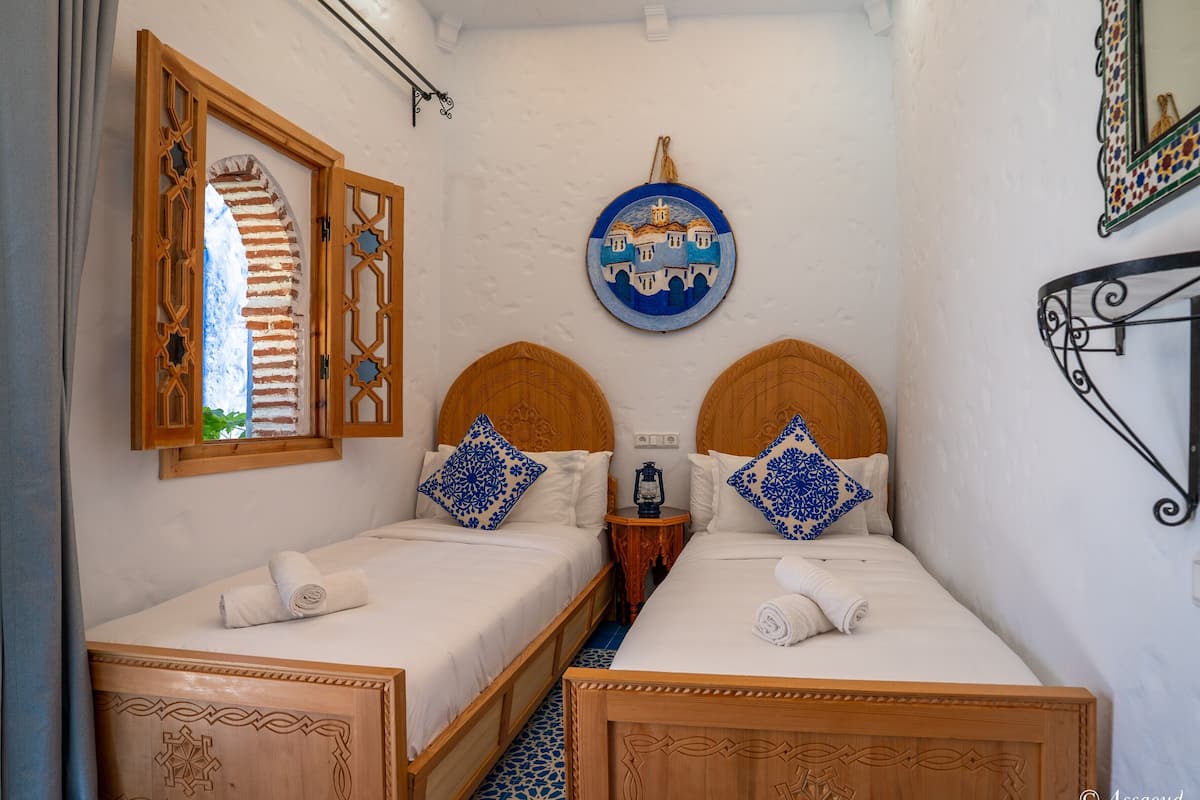 Standaard Twin kamer | Een minibar, individueel gedecoreerd, gratis wifi, beddengoed