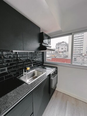 Fridge, microwave, oven, coffee/tea maker