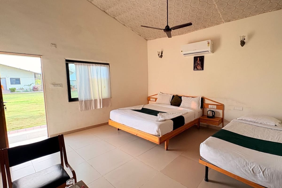 Quarto premium, vista para o jardim | Roupas de cama premium, Wi-Fi de cortesia, roupa de cama