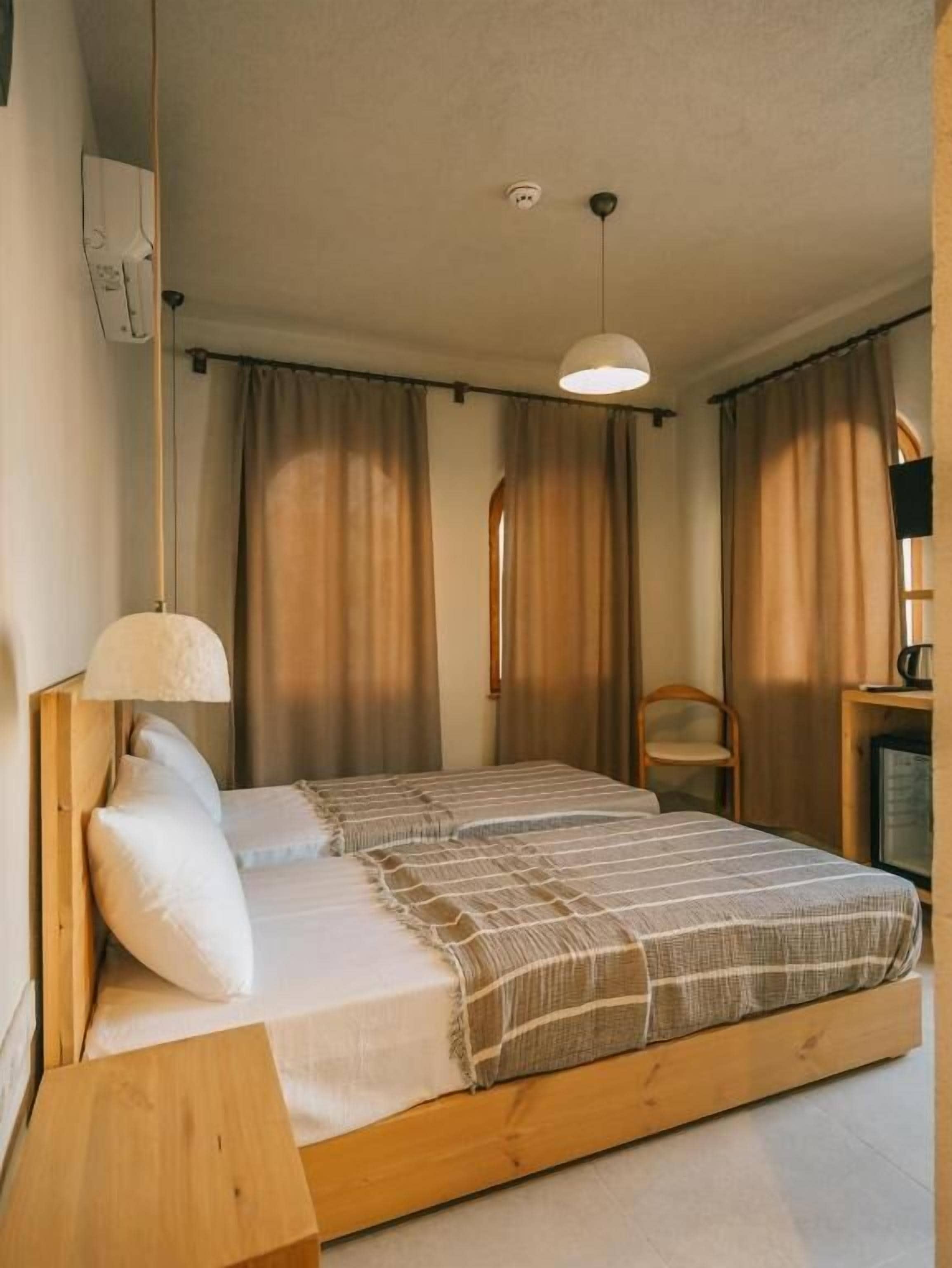 Twin Room, 2 Twin Beds, Balcony | Minibar, free WiFi, bed sheets