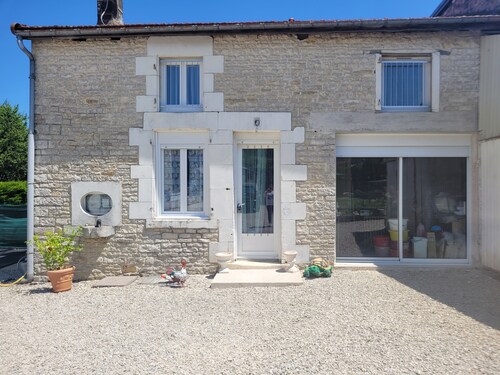 La Cadole House surrounded by a vineyard. Panoramic trails.