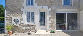 La Cadole House surrounded by a vineyard. Panoramic trails.