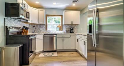 Cozy Grass Lake Home w/ Patio, Fire Pit & Kayaks!