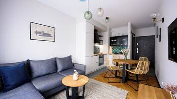Apartamento | Área de estar | TV