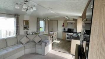 Cabin | Living area | TV, fireplace