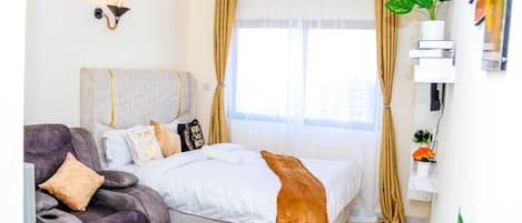 Estudi | 1 dormitori, planxa i posts de planxar, wifi gratuïta i roba de llit