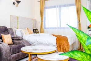 1 habitación, tabla de planchar con plancha, wifi gratis y ropa de cama 